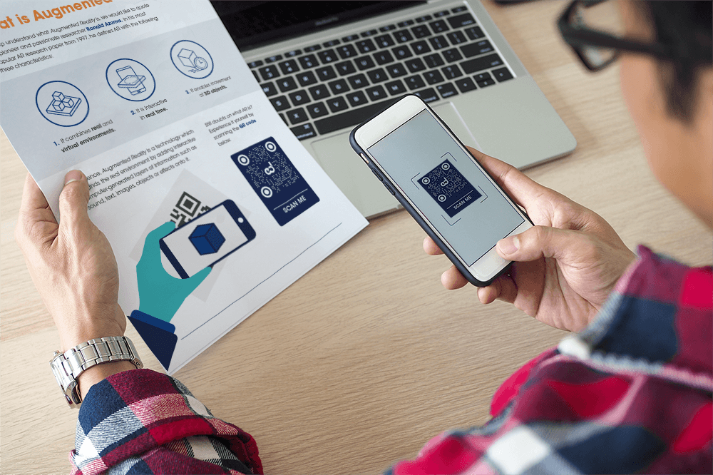 learner scanning qr code to experience augmented reality